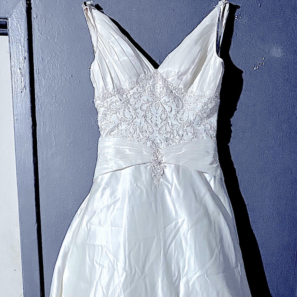 Satin pearl and lace wedding dress